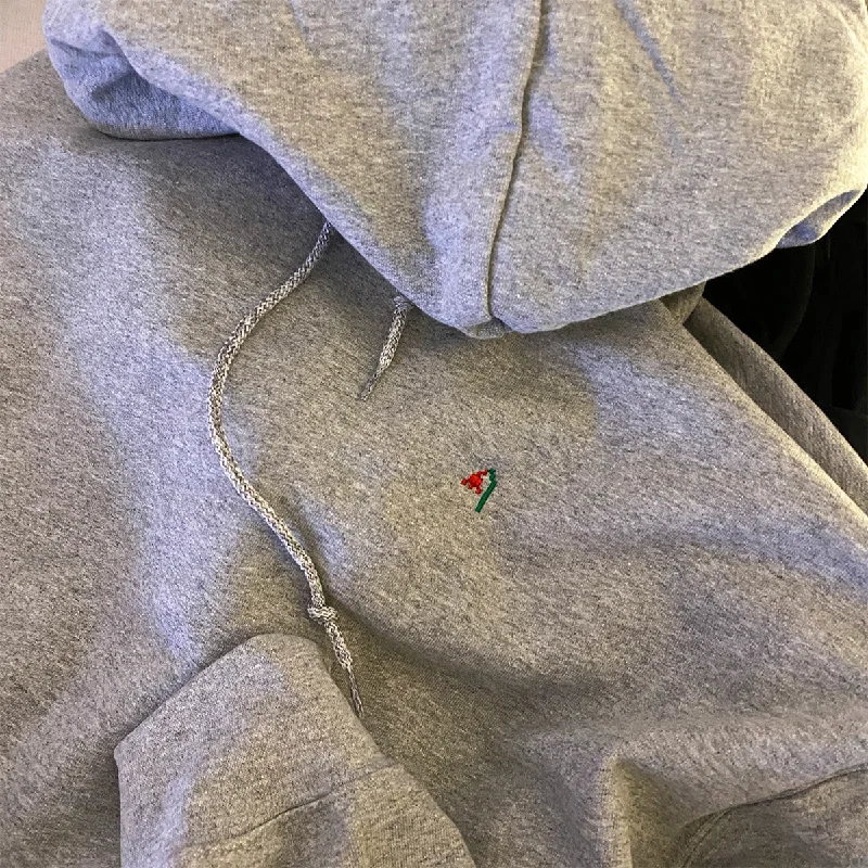 Markdown Madness MELANCHO® Embroidered Hoodie